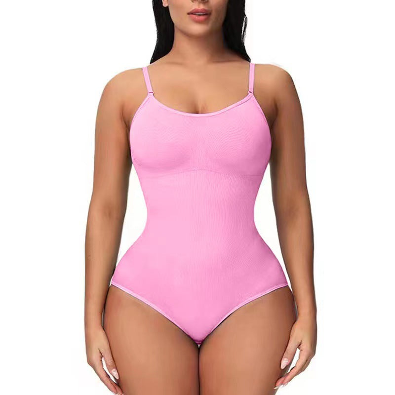 Pink one-piece swimsuit worn by a model on a white background